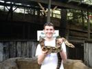 Holding a heavy snake, would you dare?